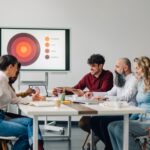 Marketing managers discussing global strategy during business meeting